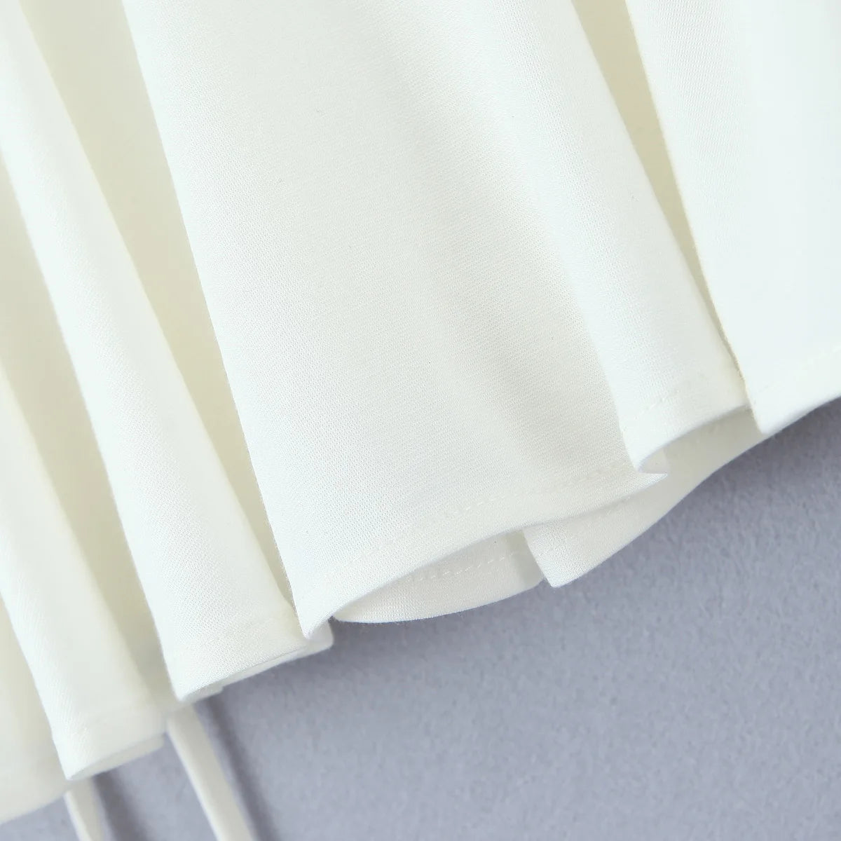 2023 Summer Y2K Style Cool Girl Asymmetrical Pleated Mini Skirts Women Rope Lacing Up Bandage Bow Waist Skirts White Black