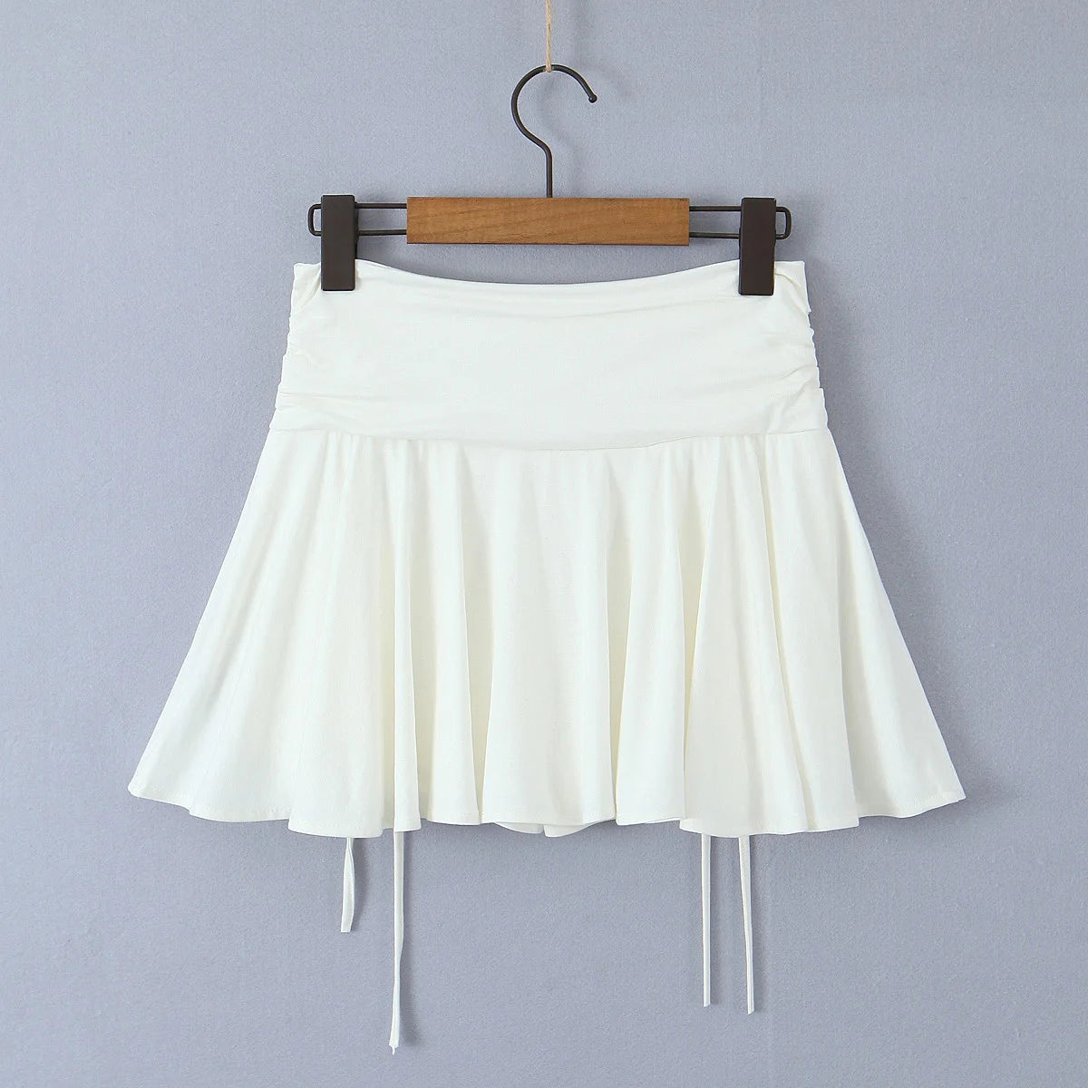 2023 Summer Y2K Style Cool Girl Asymmetrical Pleated Mini Skirts Women Rope Lacing Up Bandage Bow Waist Skirts White Black